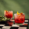 Aperol spritz and blistered peppers